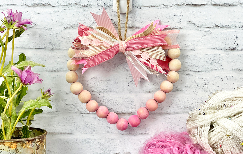 The Easiest Wood Bead Heart DIY - DIY Beautify - Creating Beauty